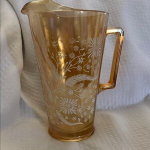 Vintage Jeannette Iridescent Marigold Carnival Glass Pitcher White Floral Design